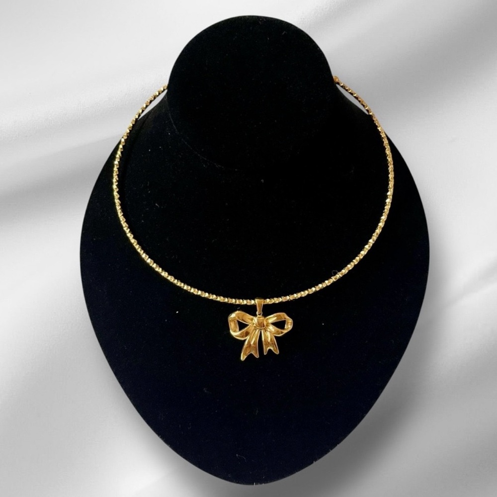 Gold Tone Stainless Steel Bow Pendant Necklace